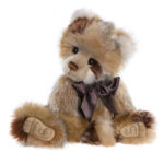 Meet Scott, a sweet and comforting companion for all ages. He is made from super-soft plush in shades of cream and brown. He has a-paw-able 'Who me?